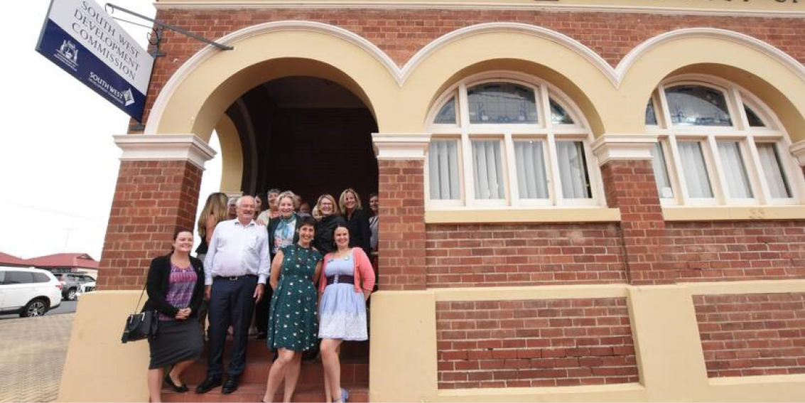 Photograph of staff in front of the South West Development Commission office in Collie