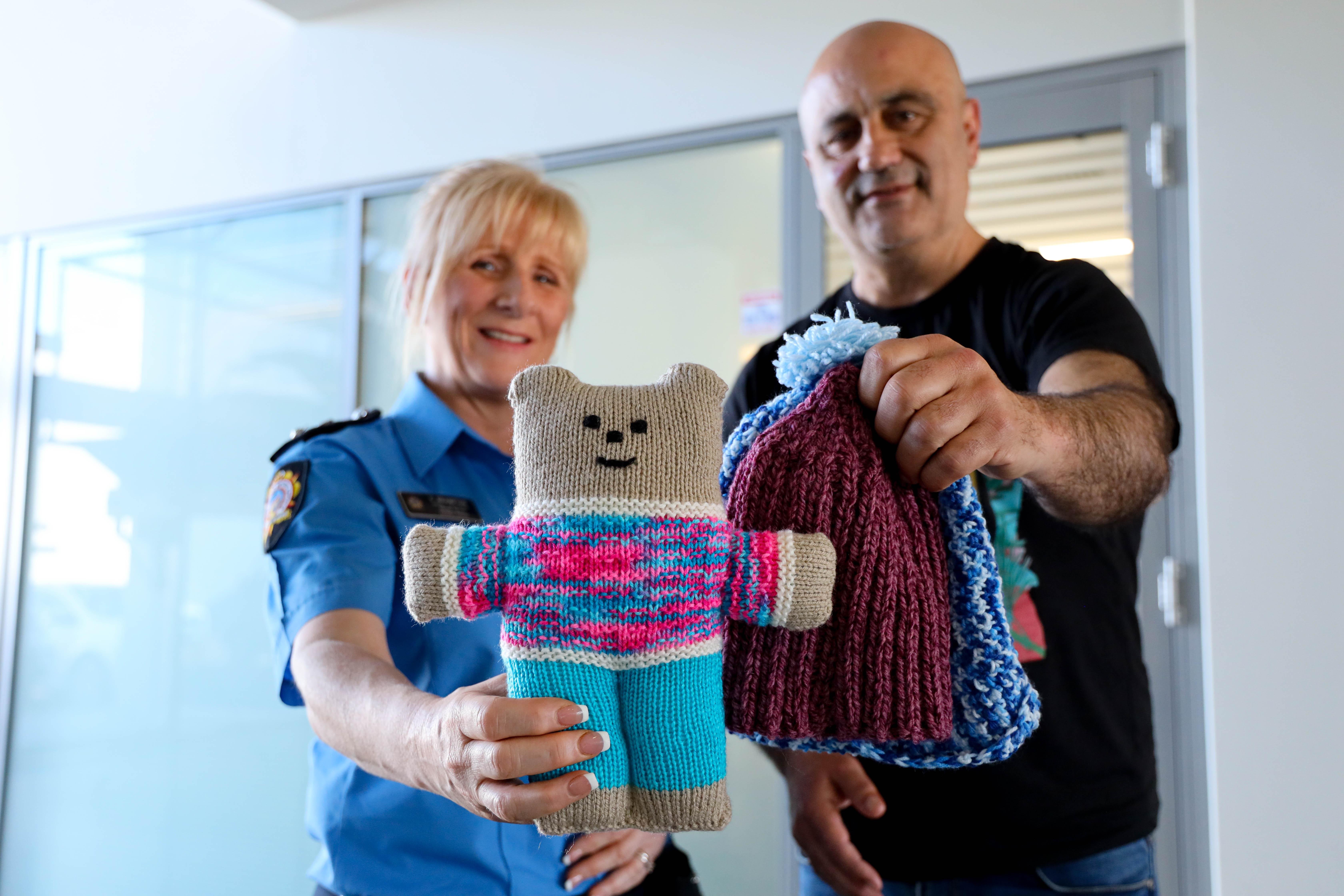 Man and women with stuffed toys
