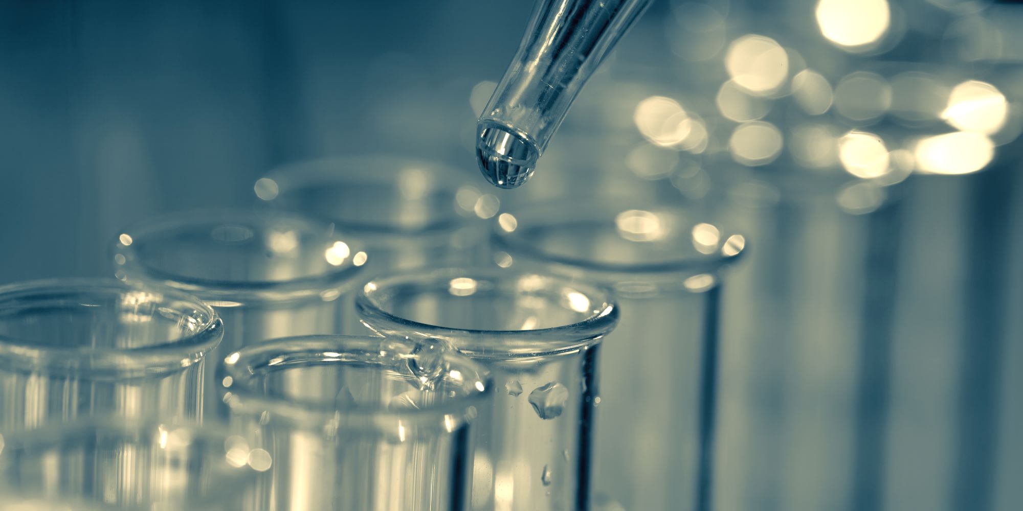 Scientific testing is conducted on water.