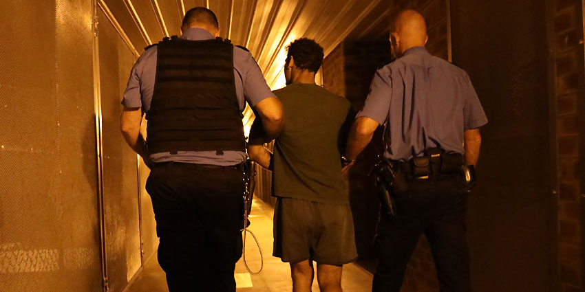 Medical call - escort through orange lit hallways