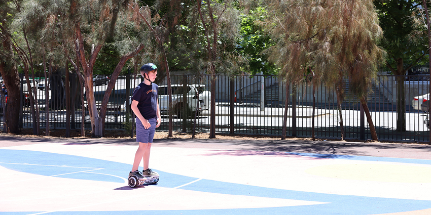 Teenager on hoverboard at Elizabeth Quay