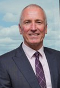 Chris Clark smiling at camera