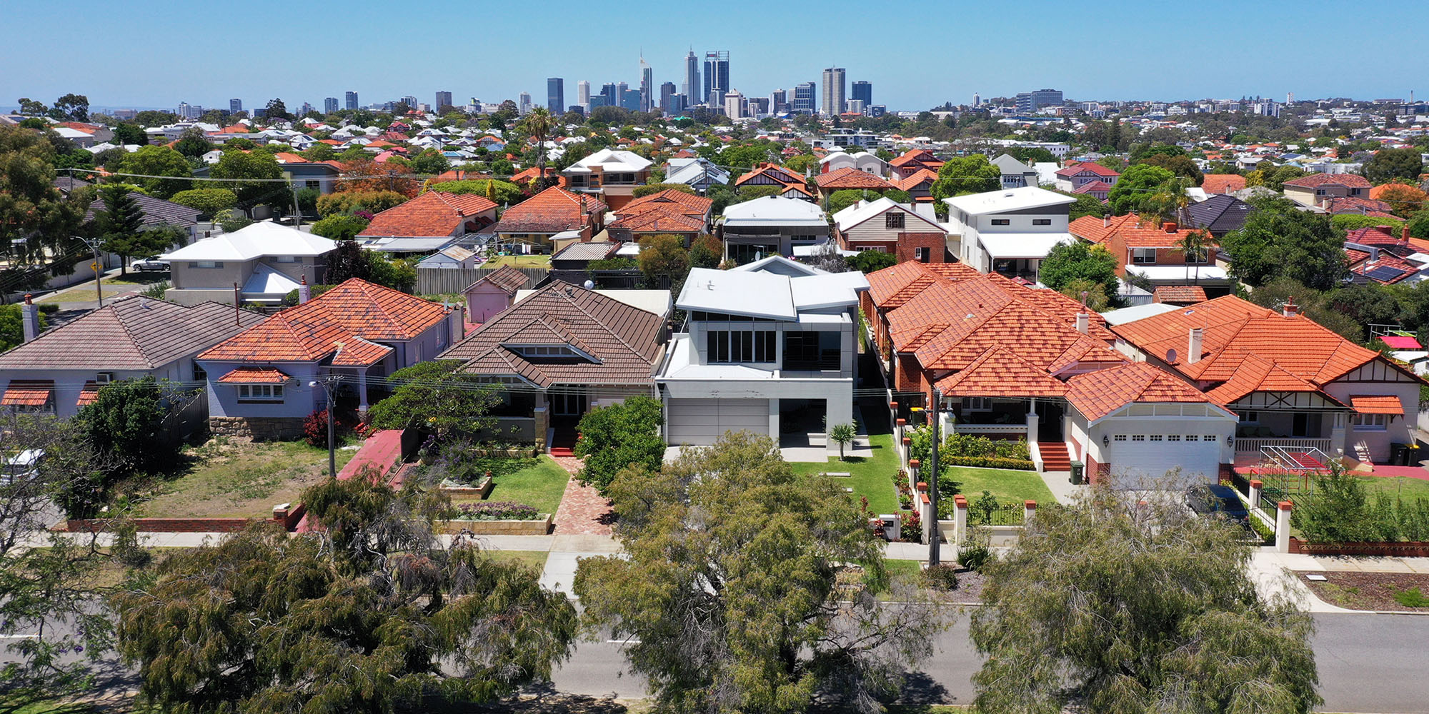 houses and perth city skyline