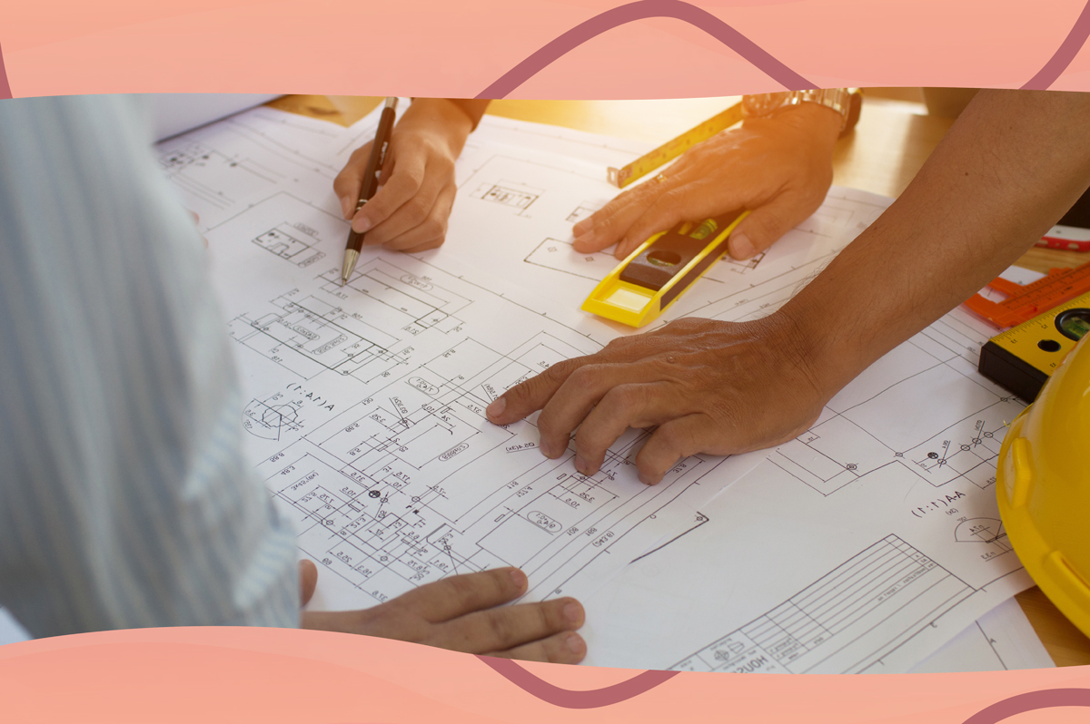 image of people looking at building design plans