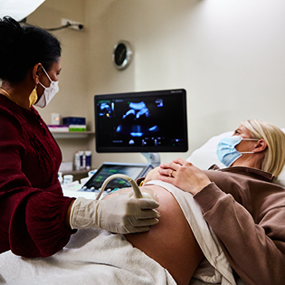 A pregnant woman getting an ultrasound