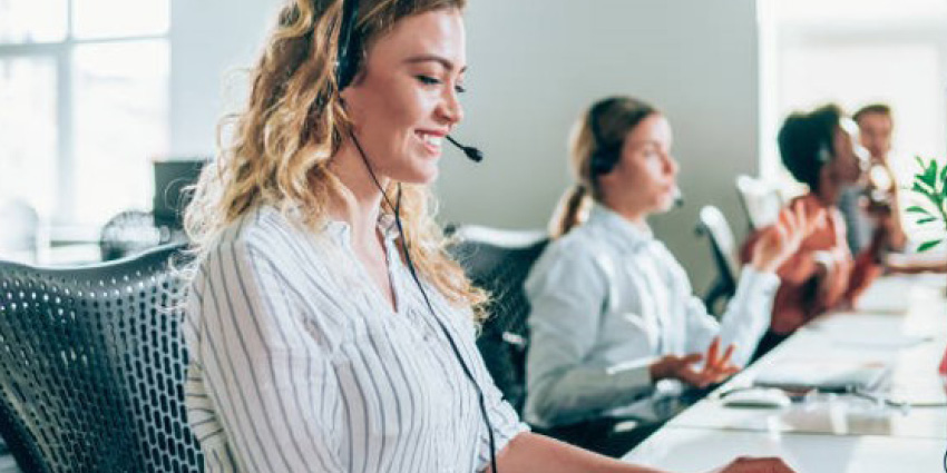 Women answering phones in a call centre