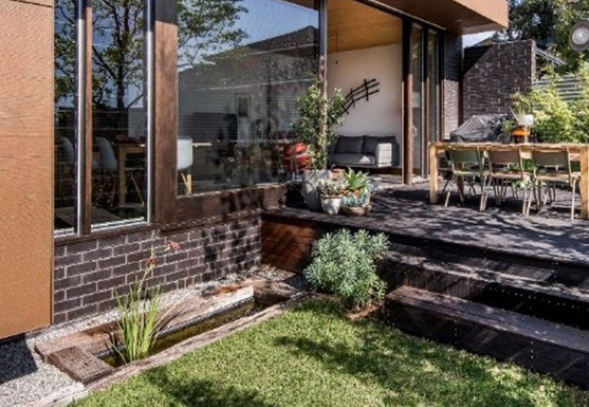Photo of a generous garden design - by Gresley Abas Architects and Justine Monk Design