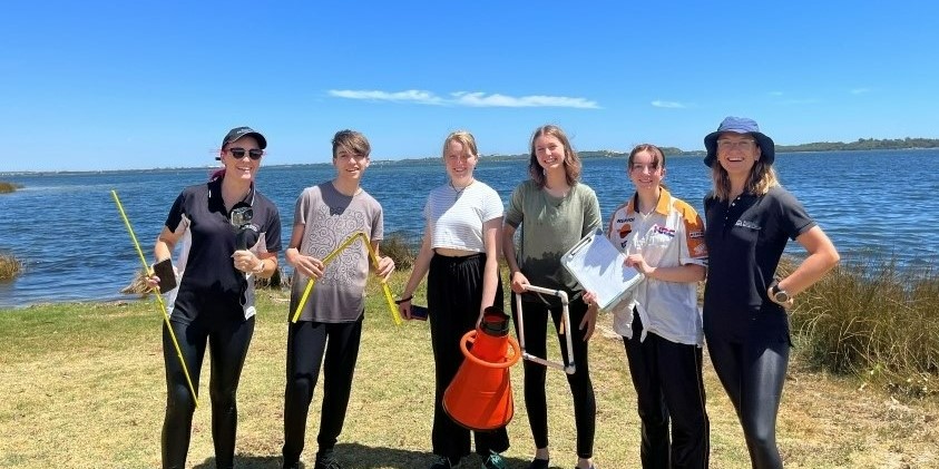 Manea Senior College teacher Lynette Hillier and students with DWER's Caitlyn O'Dea