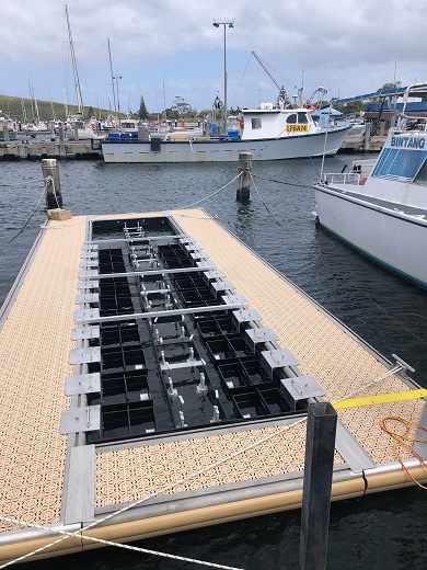 FLoating UPweller SYstem where shellfish seed grow inside mesh pots and feed on food particles and phytoplankton pumped through sea water