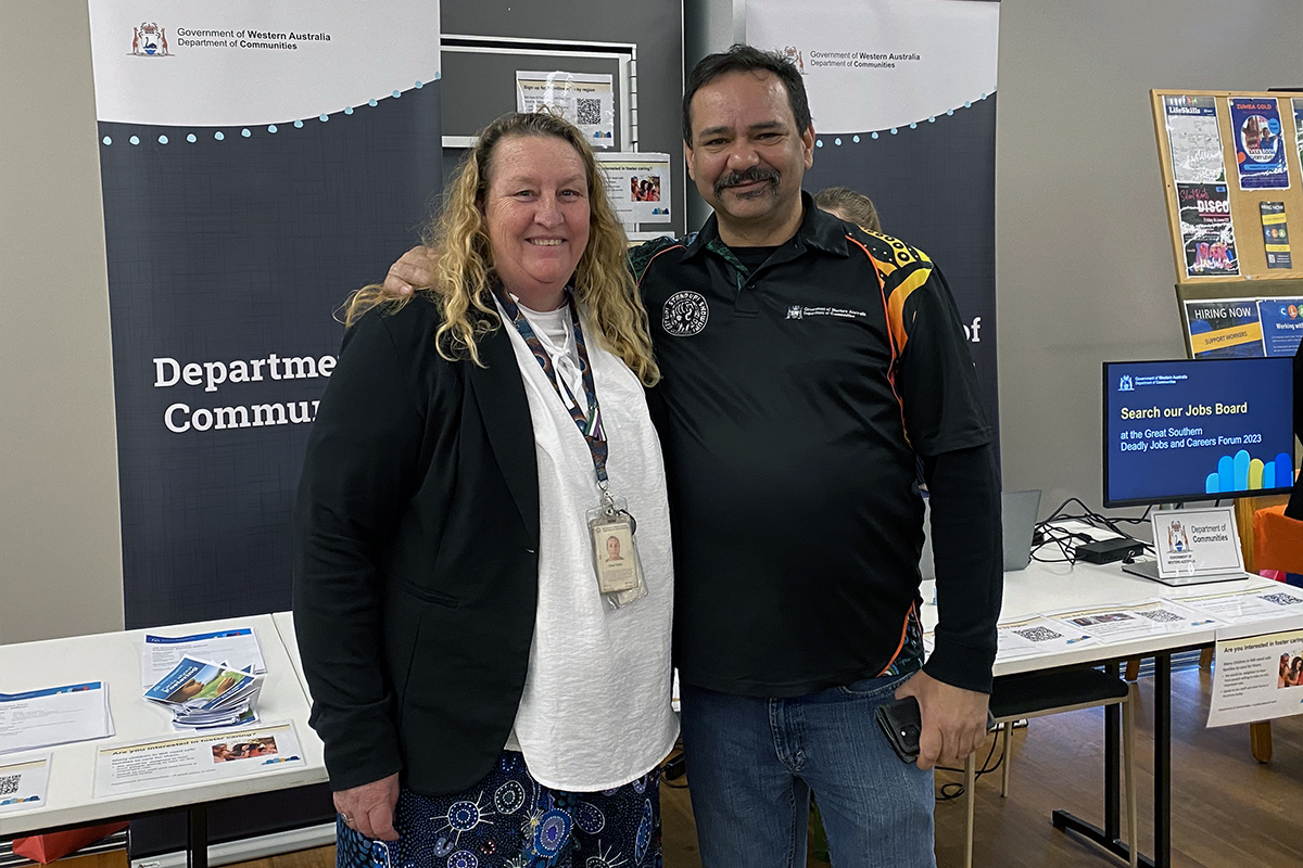 Image of two Communities staff members - a man and a woman