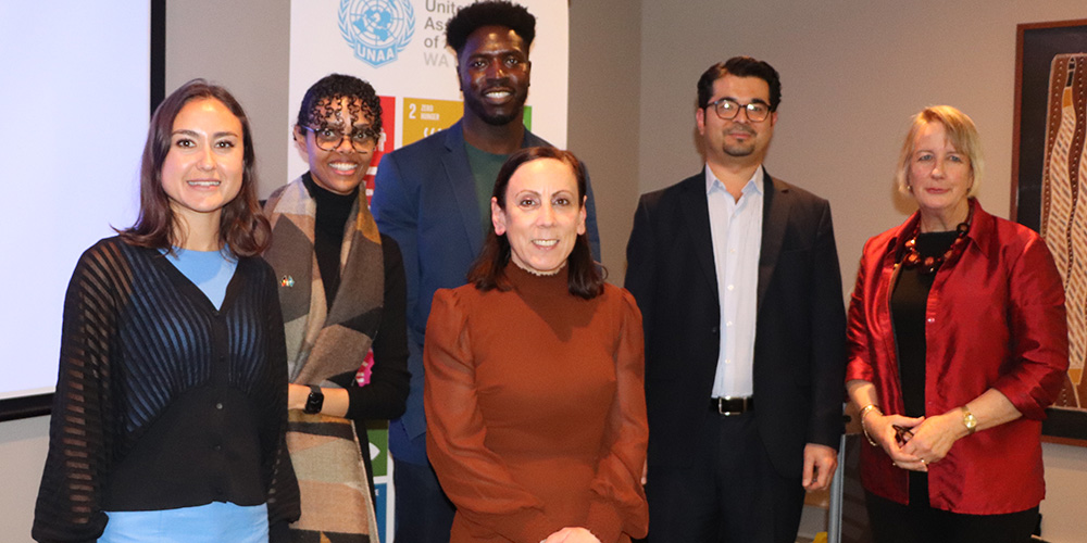 group shot Assadullah with members of UNAAWA, Refugee Council and Diana MacTiernan from the EOC