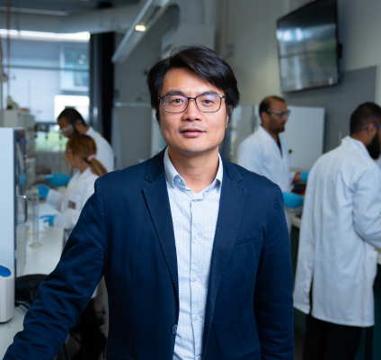 Portrait of Hongqi Sun in a laboratory