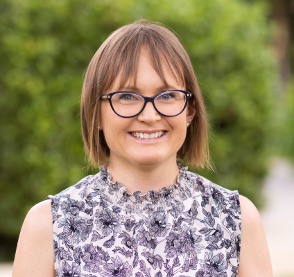 A portrait of Ingrid Stacey outside 