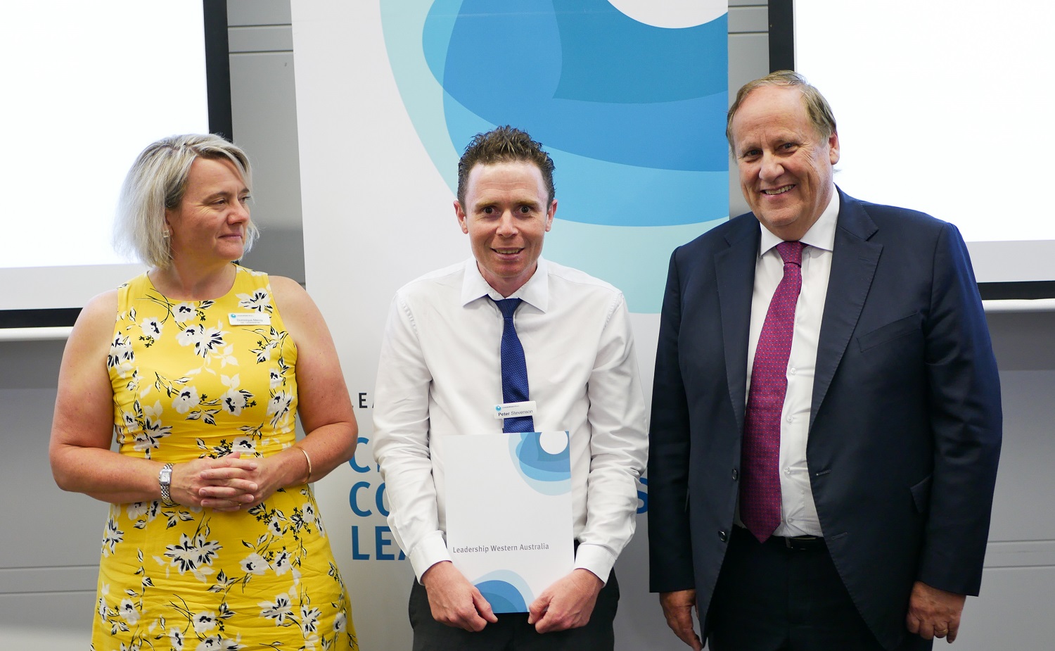 Photo of Communities staff members beside the WA Disabilities Minister 