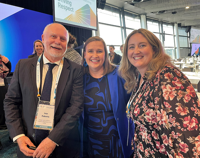 A man and two women at the summit