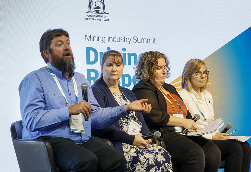 Four people fronting panel discussion 3