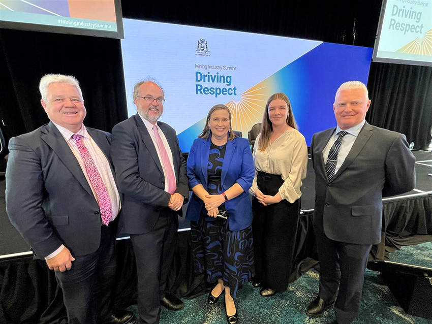 Group photo of three men and two women