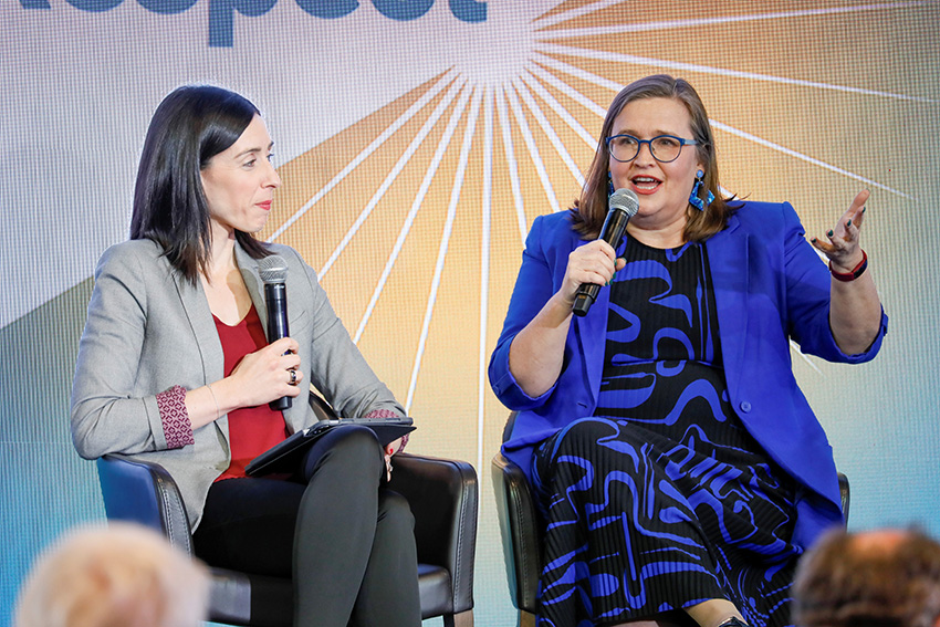 Two women answering questions from the audience