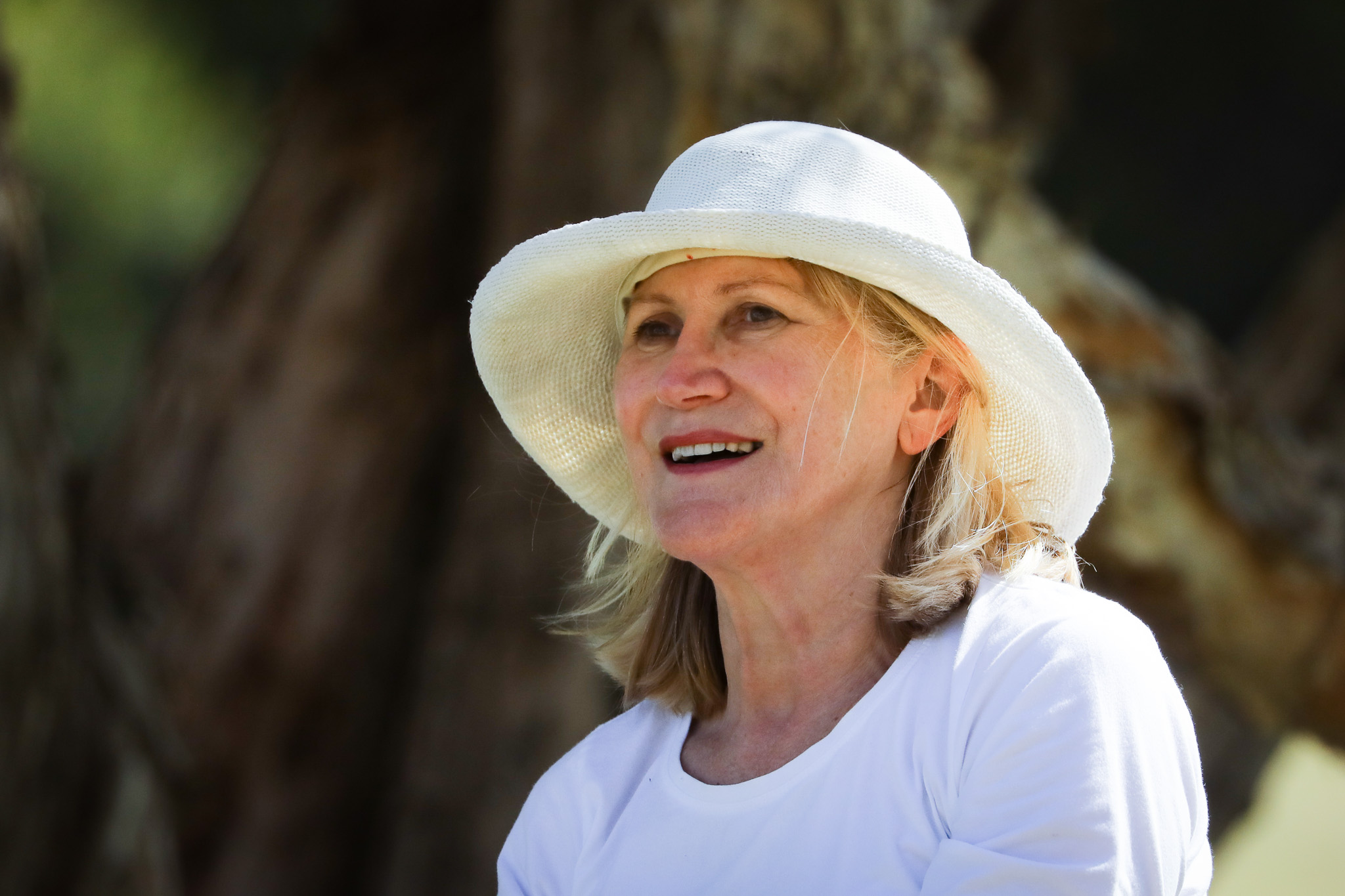 senior person wearing hat