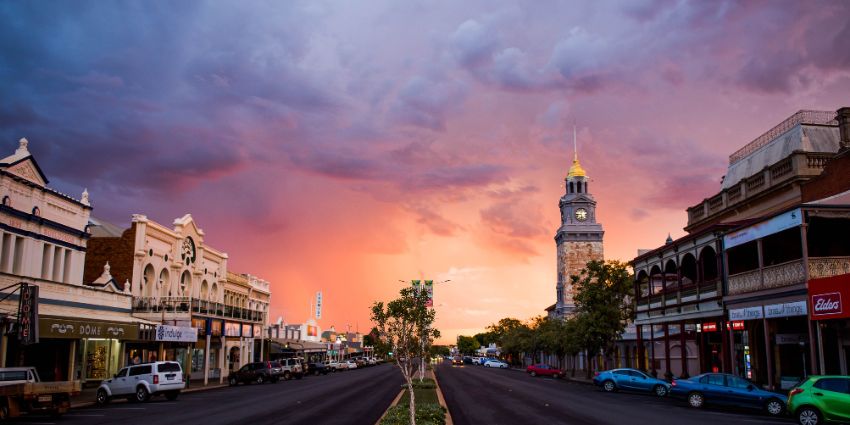 landscape view of a town during sunset