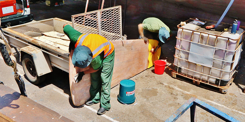 Prisoners from Greenough Regional Prison work on the Batavia longboat as part of a major restoration..