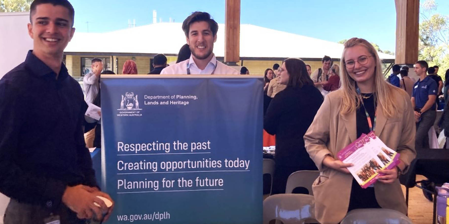 Image of DPLH staff at the Graduate Fair