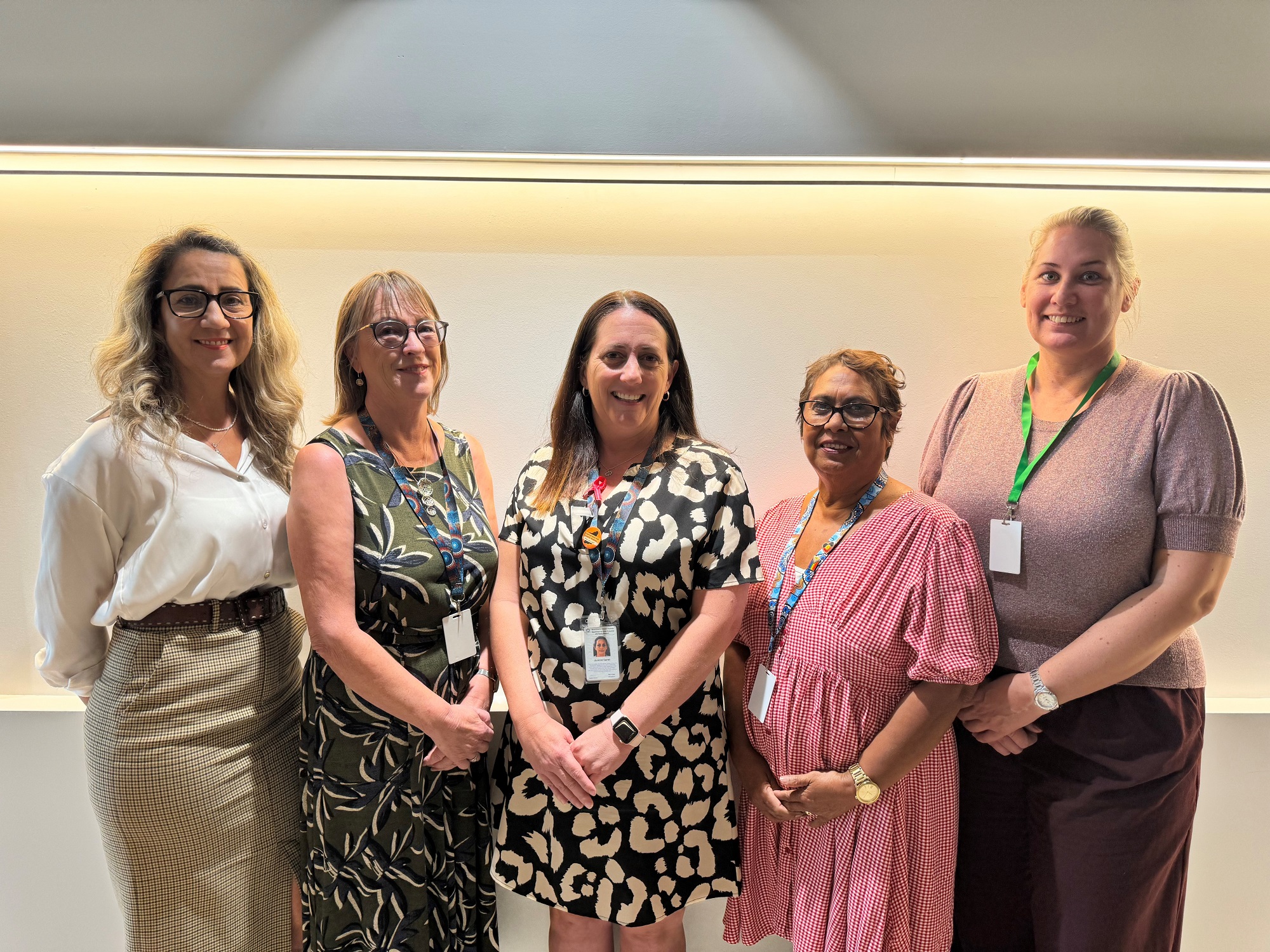 Group photo of a group of five women who work in Communities Foster and Family Care team