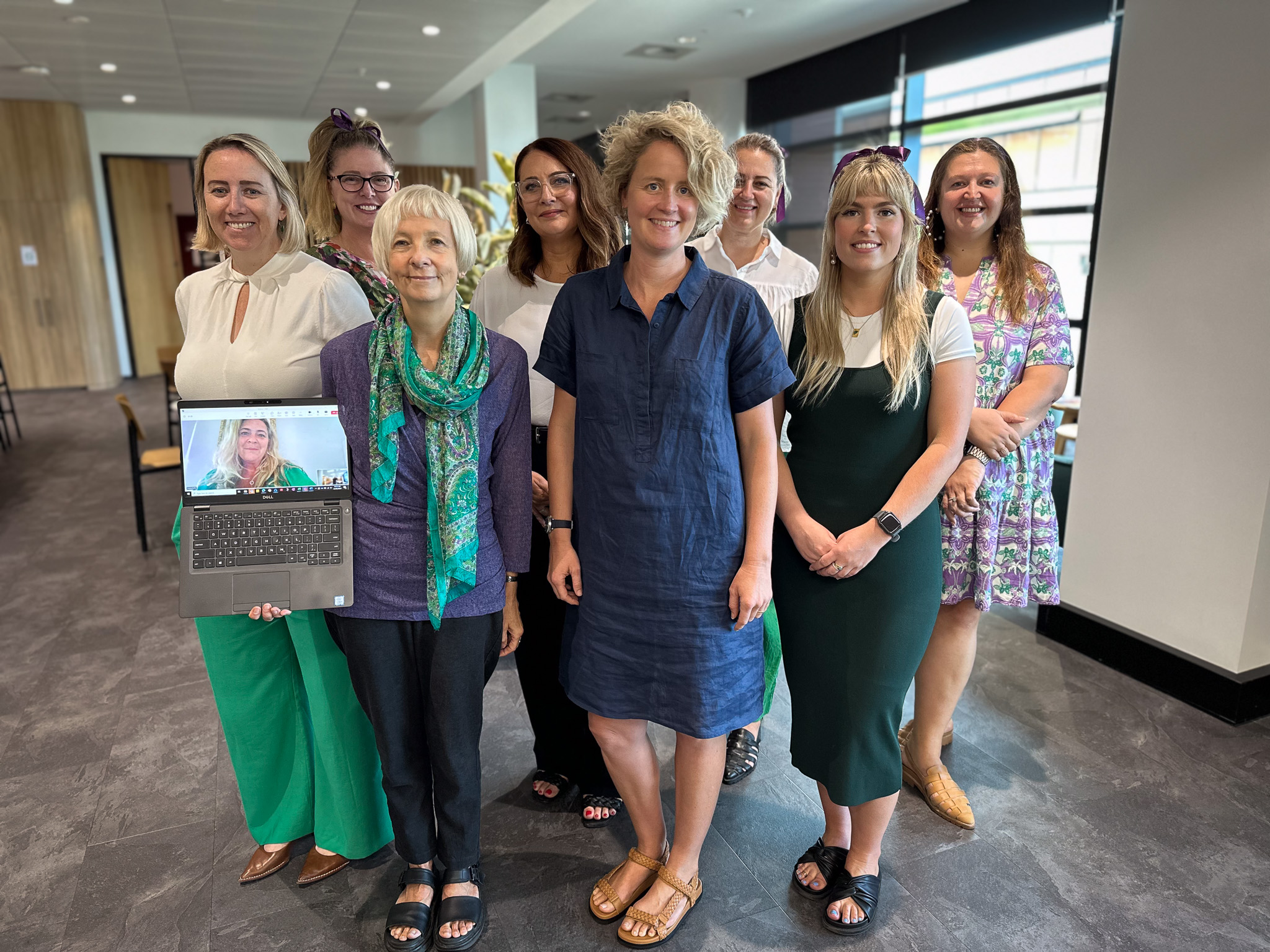 Image of a group of female Communities employees 