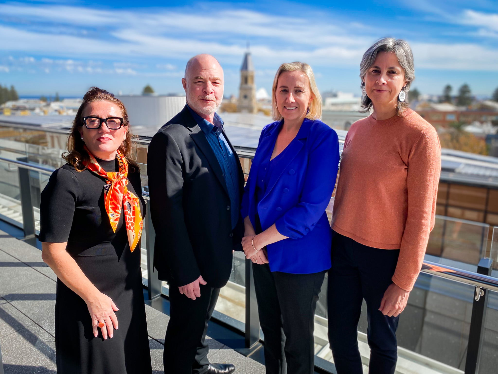 Photo of Dr Jackson Katz with Communities leaders Caroline Tavares, Adelaide Follington and Selina Getley
