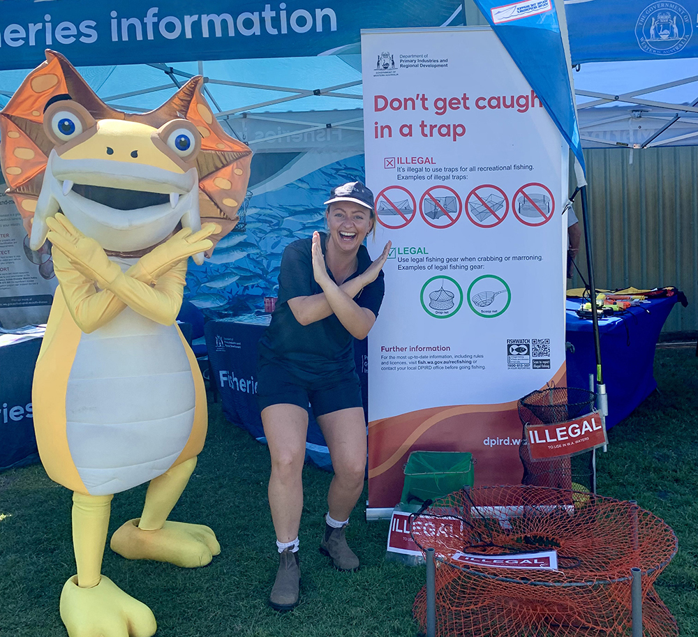 DPIRD community education officer Danielle Linardopoulos and friend spread the message of not using illegal traps.