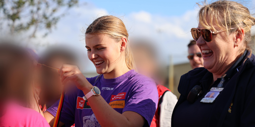 Football stars team up with prisoners for NAIDOC Week