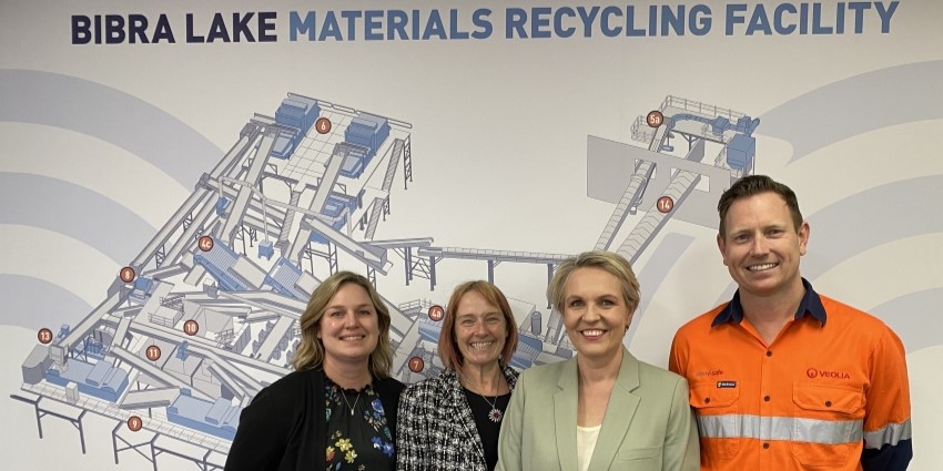 Minister Plibersek and department staff at materials recycling facility