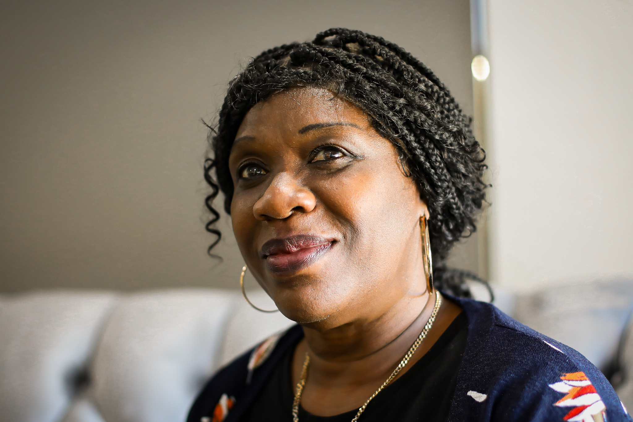 Head and shoulders photo of a woman smiling
