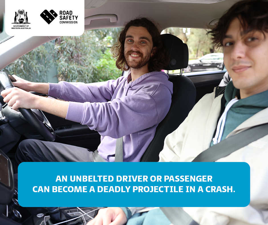 Image showing male driver and male passenger with seatbelts on