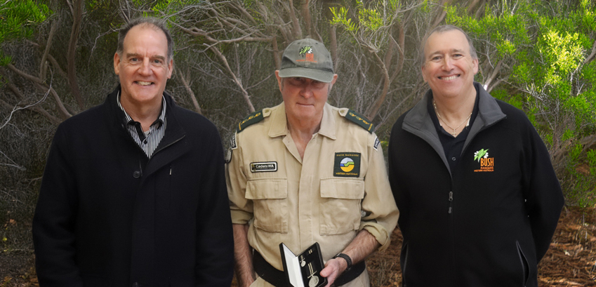 A photo of Lincoln George, Darryl Deacon, and Brad Cusworth smiling and looking at the camera