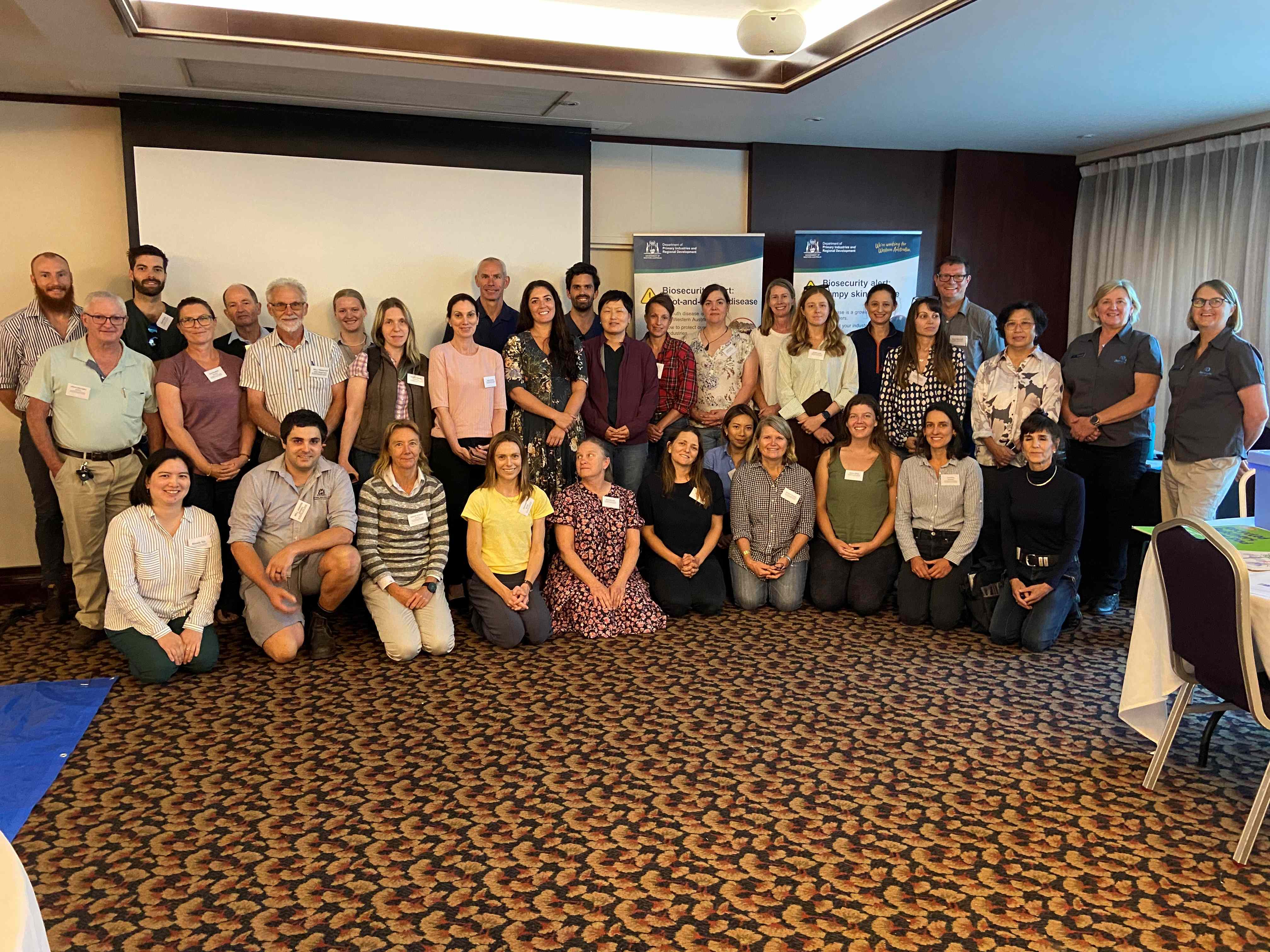 A big group of people in a training room.