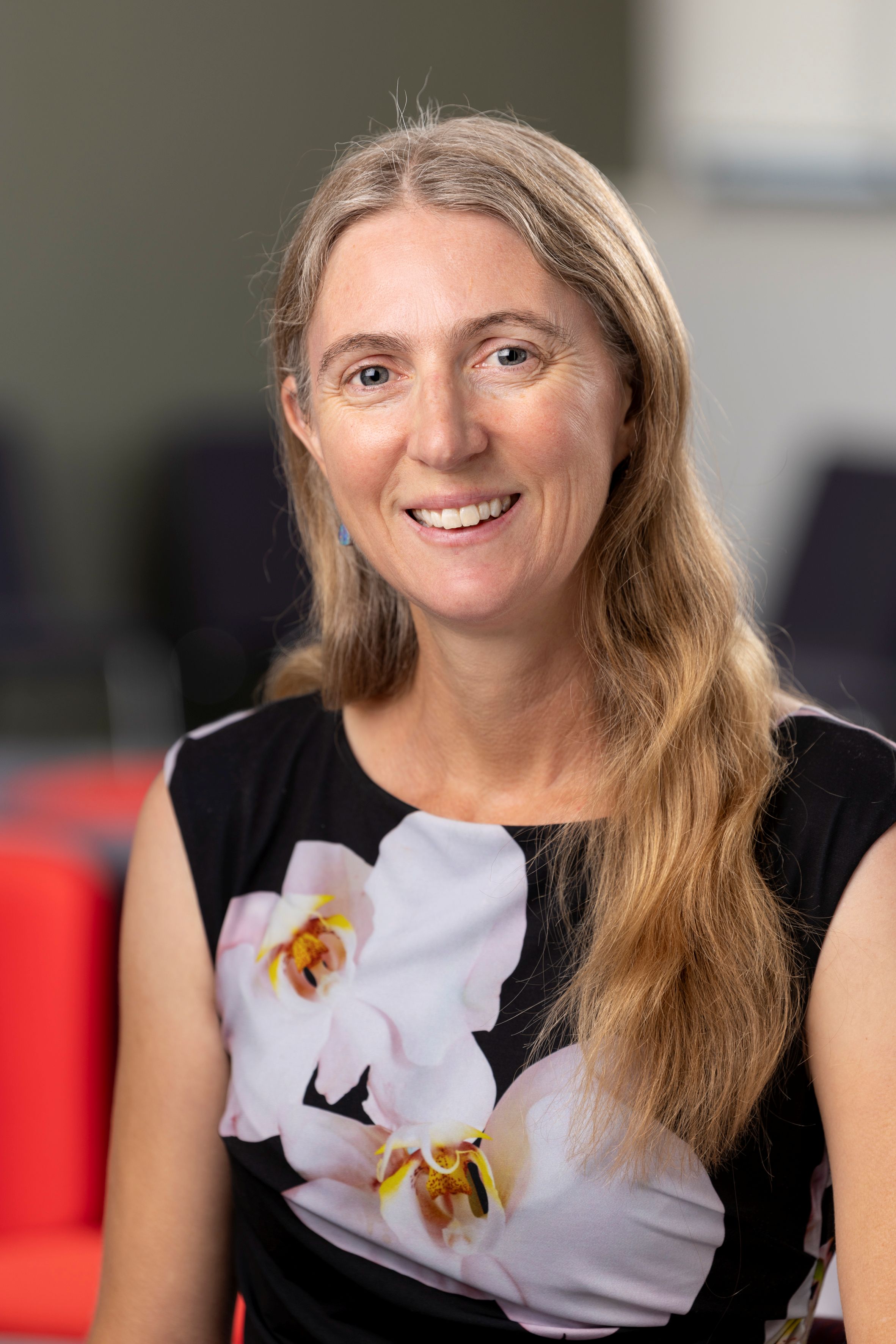 close shot of psa finalist cathryn trott wearing floral black top