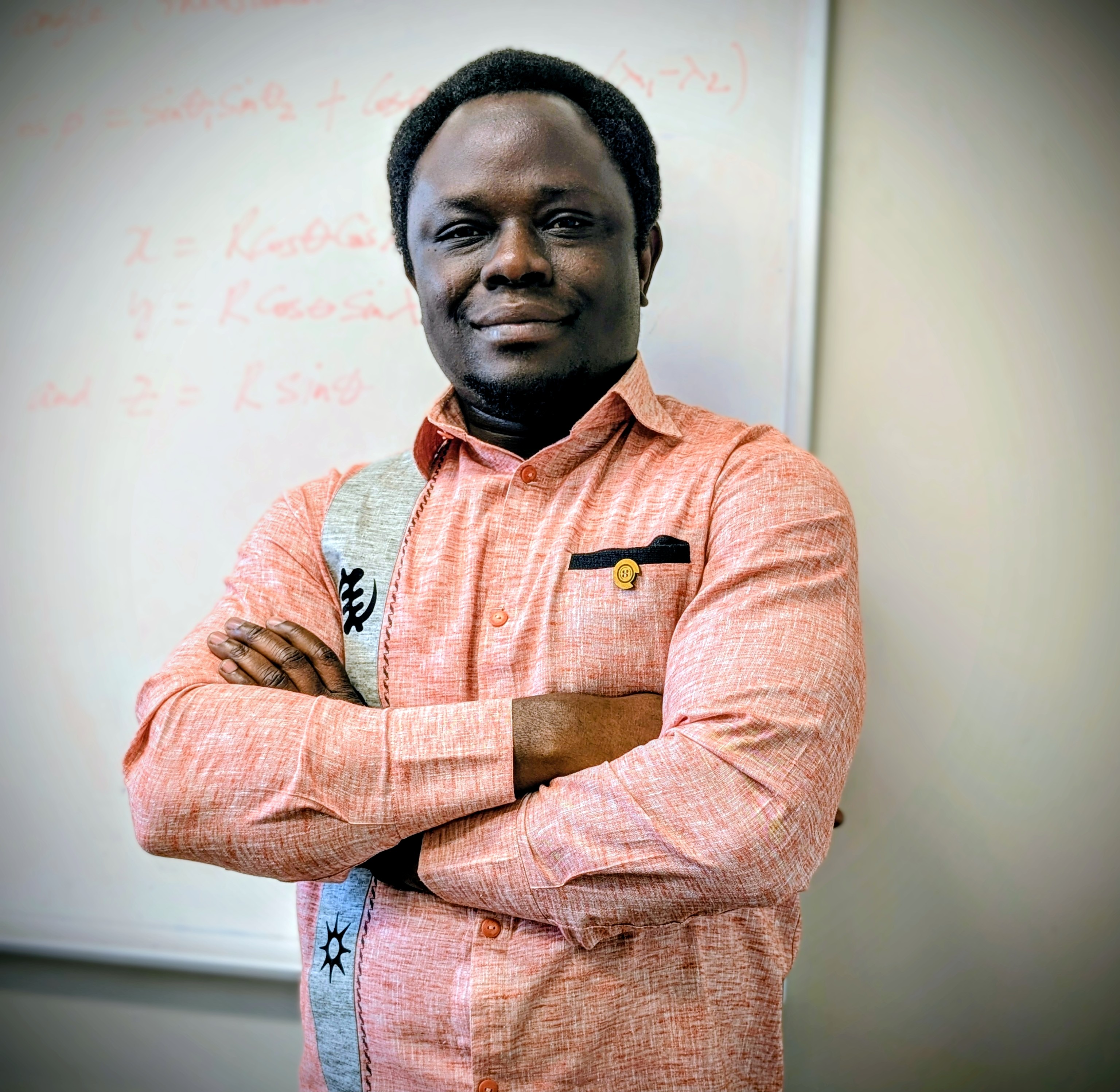 psa finalist ebenezer afrifa yamoah wearing pink top standing with crossed arms