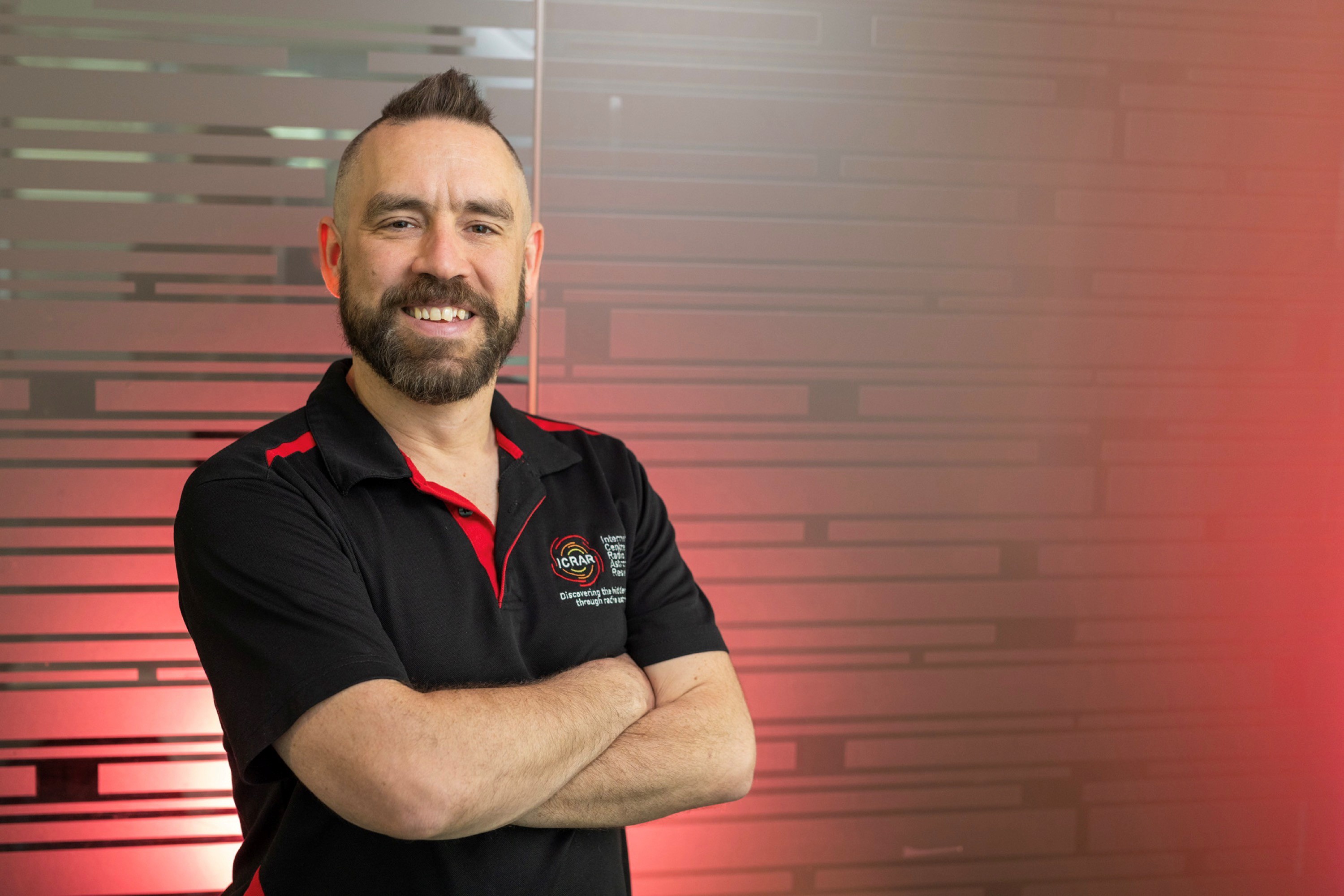 psa finalist sascha schediwy standing with crossed arms