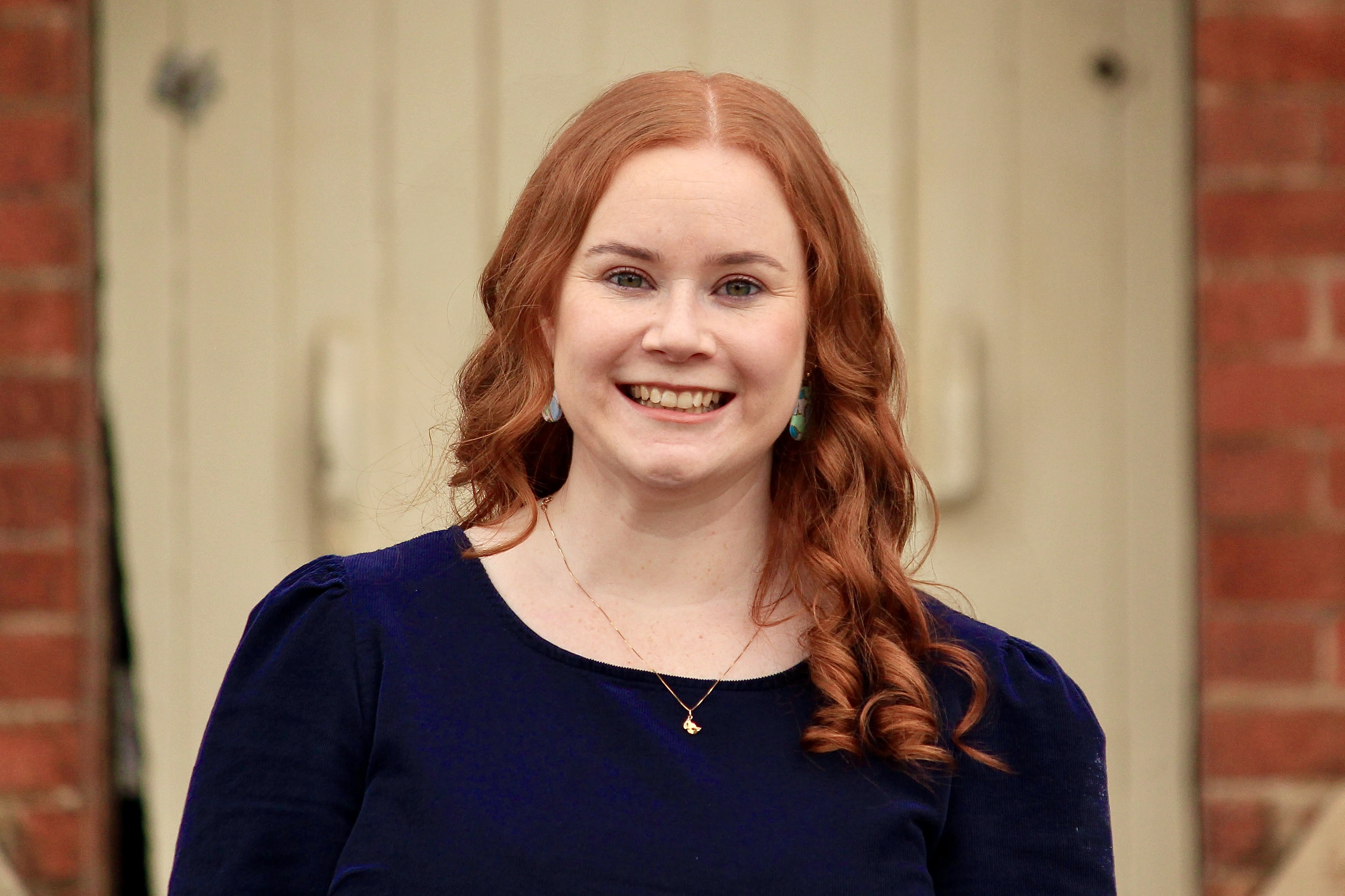 close shot of psa finalist stephanie enkel wearing navy blue top 