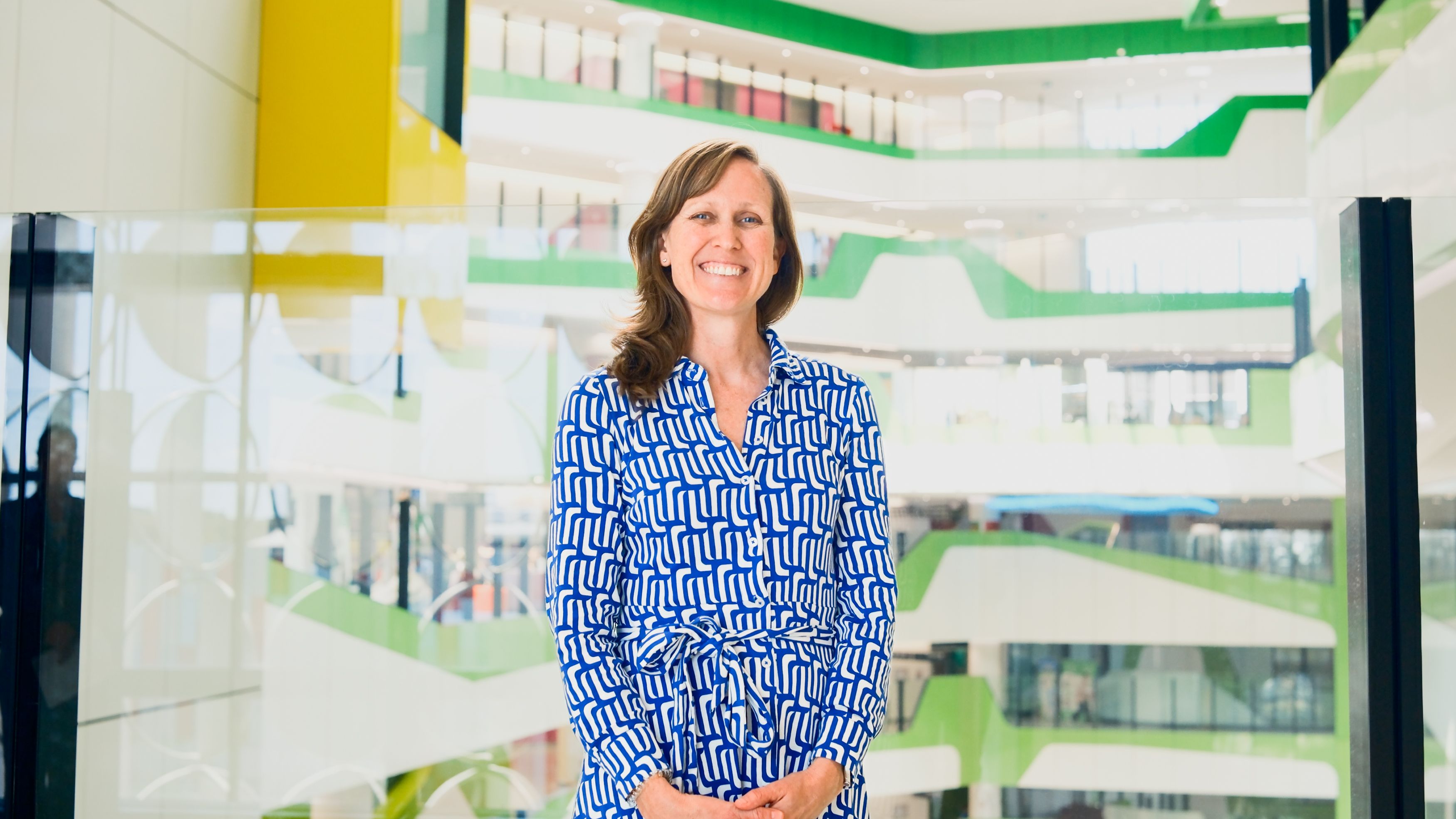 psa finalist asha bowen standing in the halls of The Kids Institute