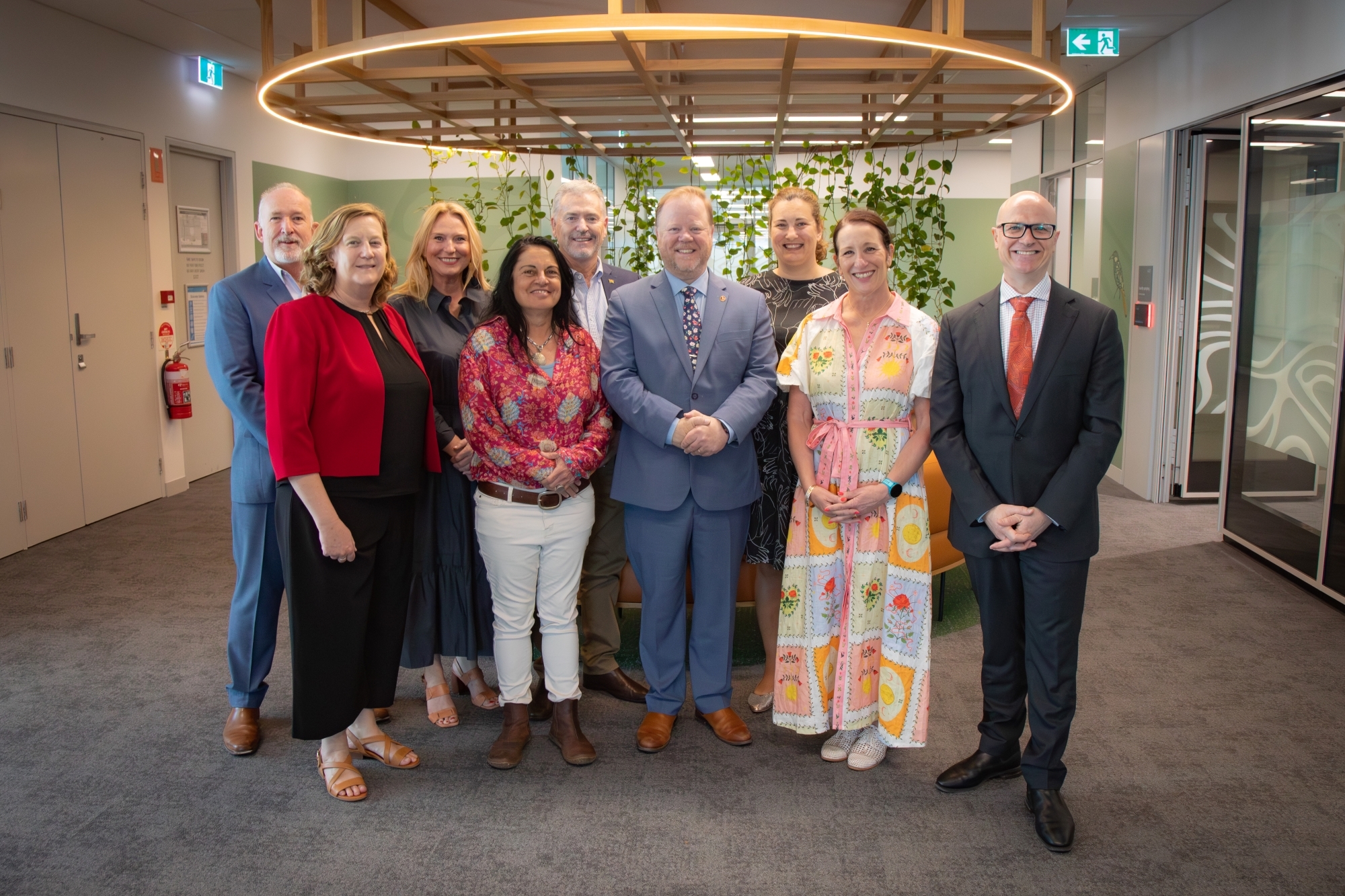 A group photo of Communities staff in an office environment