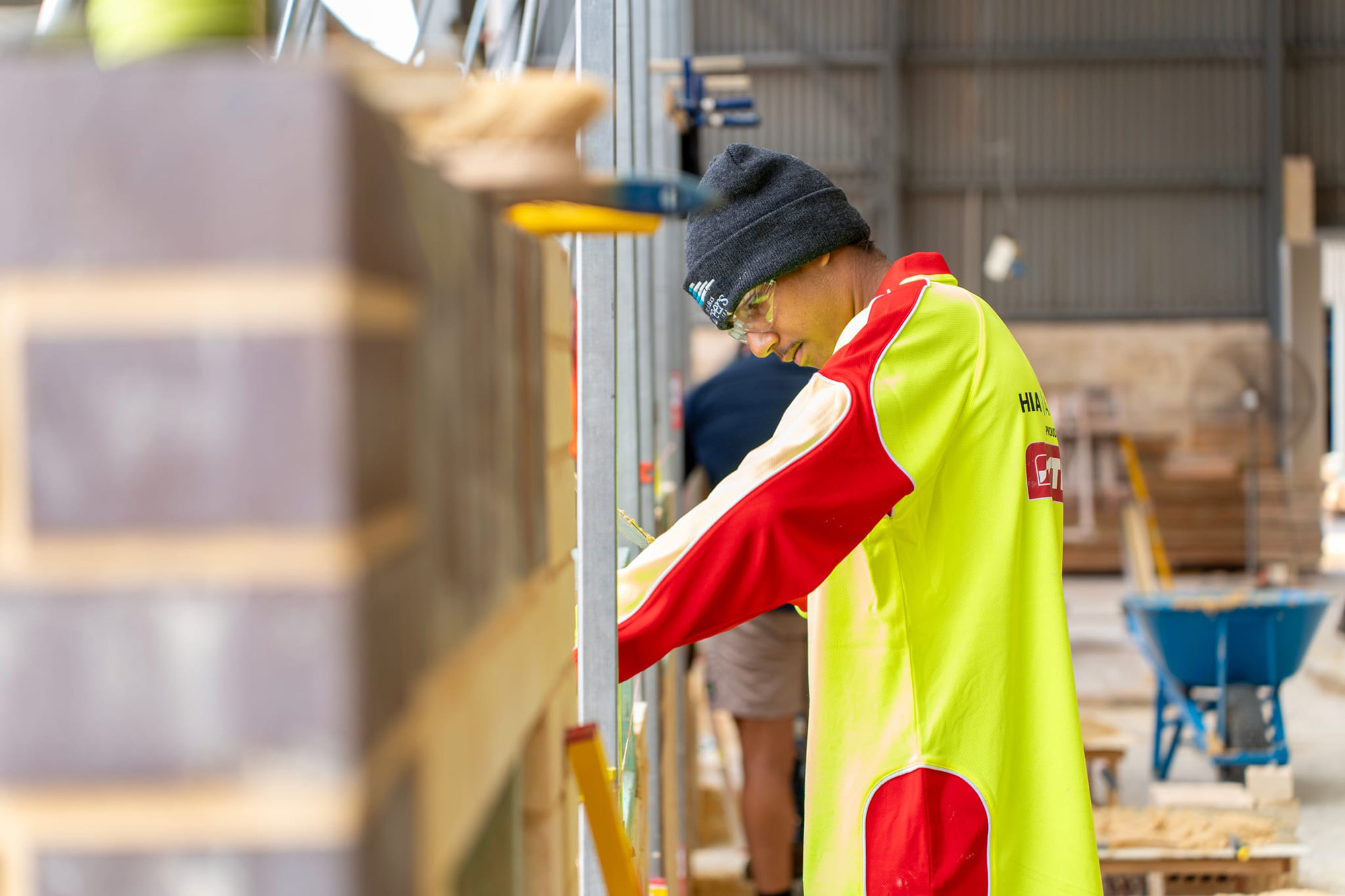 male apprentice working at a workshop