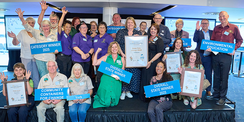 A group photo of all Tidy Town winners 2025 at the awards luncheon