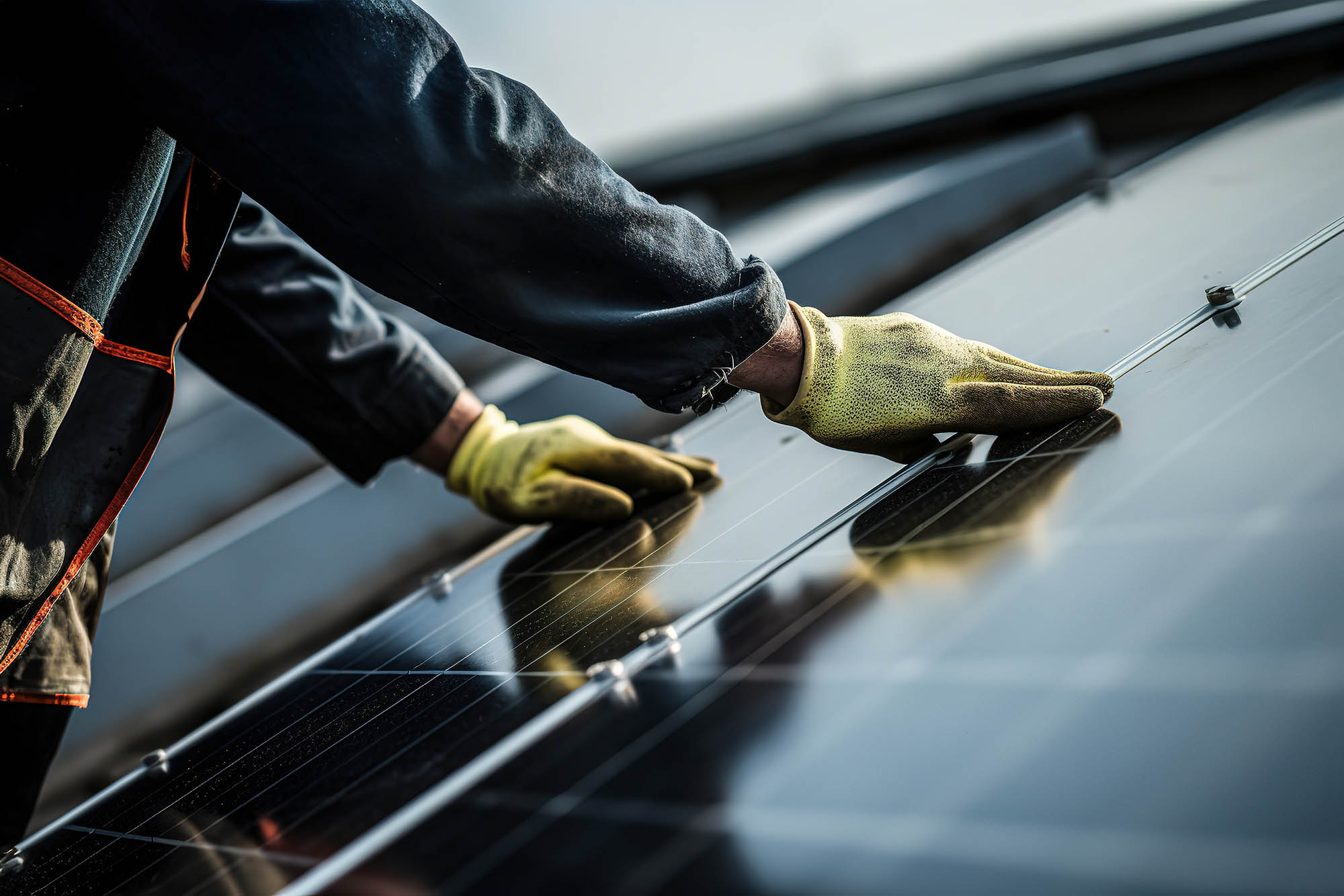 Installer touching solar panels