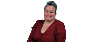 a woman, dressed professionally, smiling. Head and shoulders pictured.