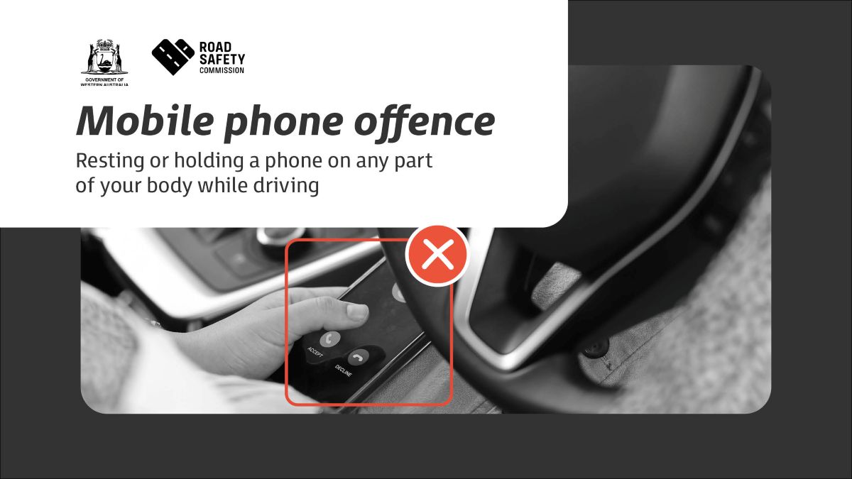 Example of a mobile phone offence - holding the phone while driving