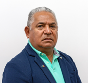 anthony is wearing a suit and looking at the camera