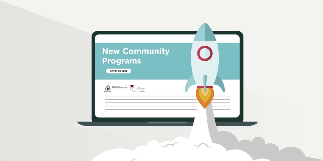 laptop screen with text announcing new program. A cartoon rocket emoji is in front of the screen