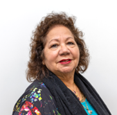 irene is smiling and looking at the camera